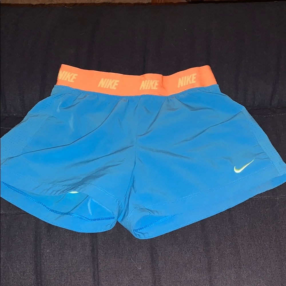 Blue and orange nike shorts
